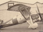 077e