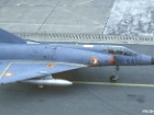 084b